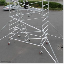 6M Scaffolding Including Two Separate Ladders and Three  Planks.