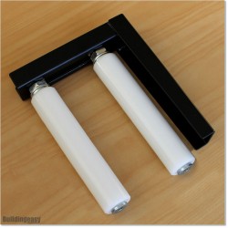 Two Roller Guide With Strong L Bracket and Two 250mm Large White Rollers.