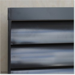 Aluminium Louver Fence Frame Look is 1.7M high and 1.8M wide. Colour is Iron Sand.