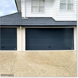 European manufactured Insulated Garage Door RL7016 colour installed with with Sommer Opener